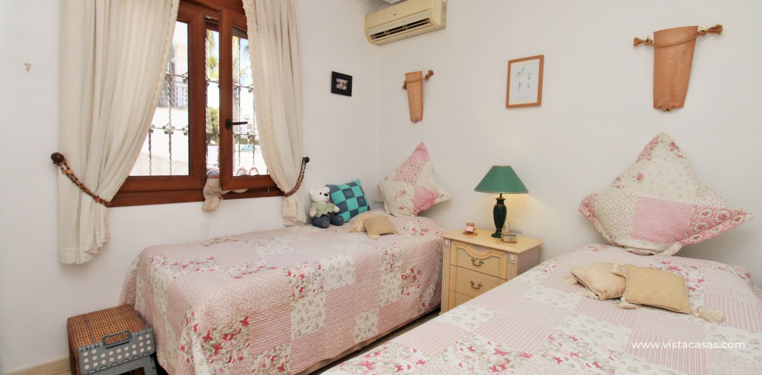 South-Facing 2 Bed Apartment with Solarium Villamartin twin bedroom