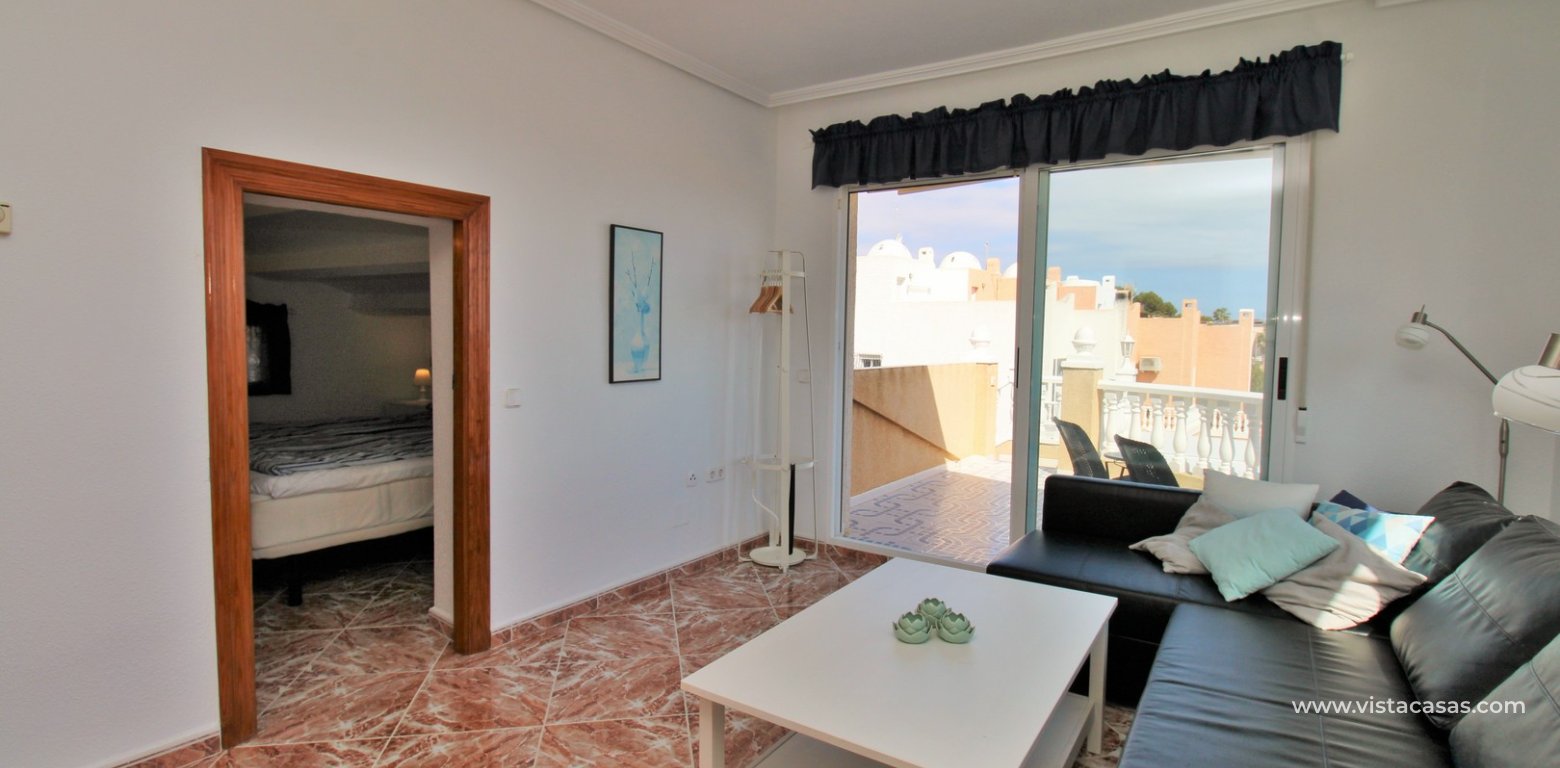 Sea View Villa with Heated Pool in Villamartin upstairs annex lounge