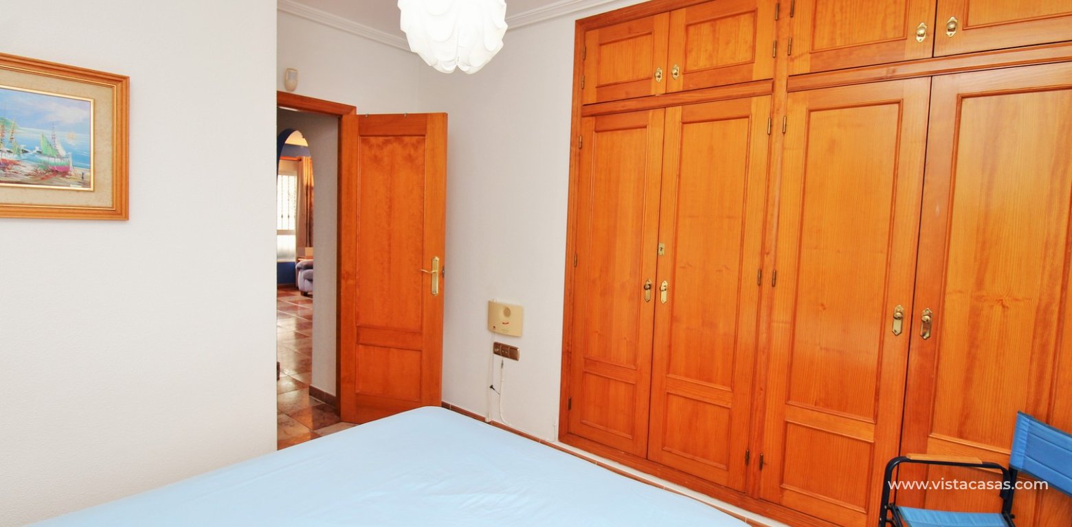 2 Bed Pool View Apartment for Sale in La Zenia master bedroom fitted wardrobes