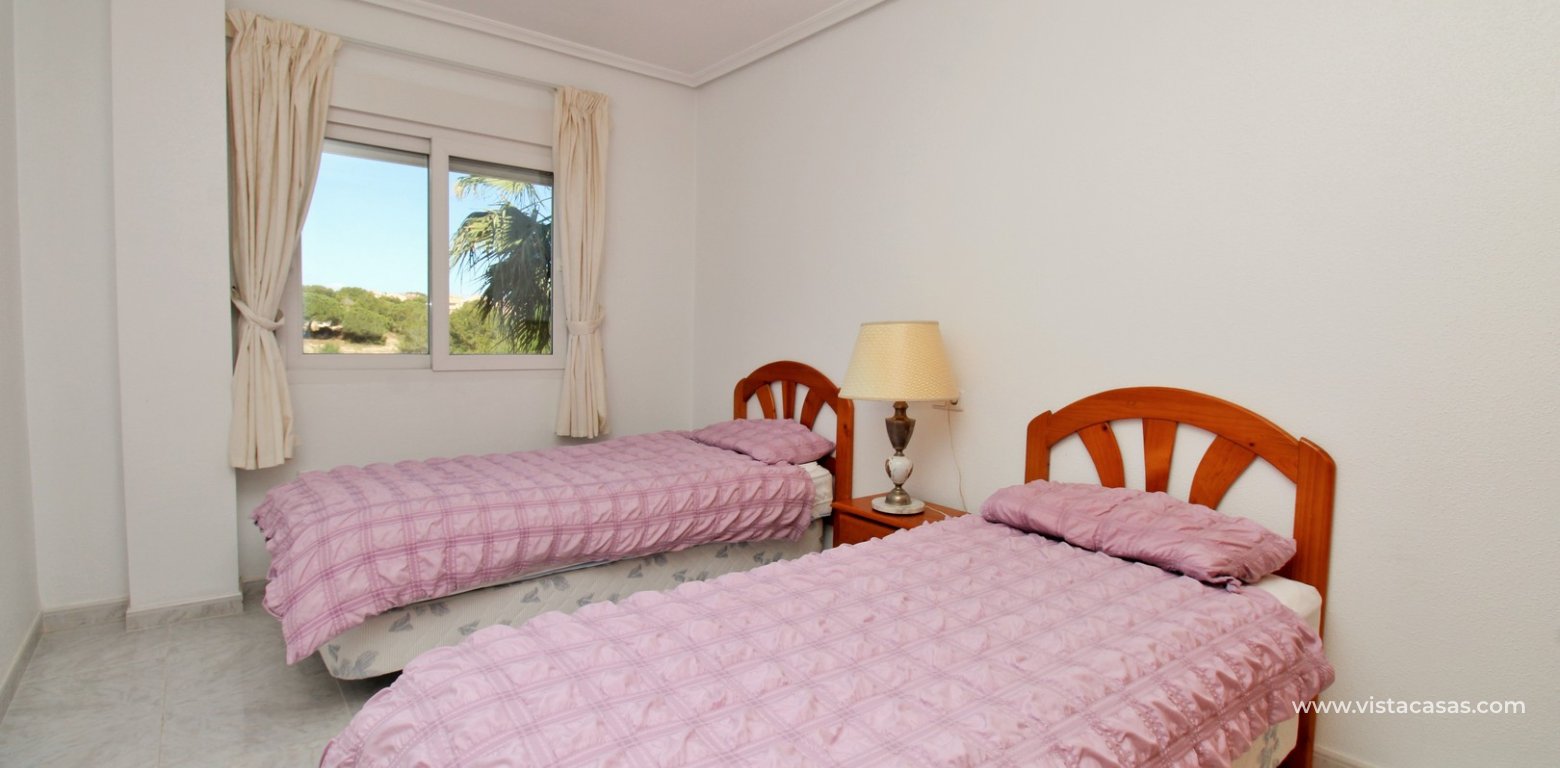 3 Bed Apartment In Playa Flamenca V Near Beach twin bedroom