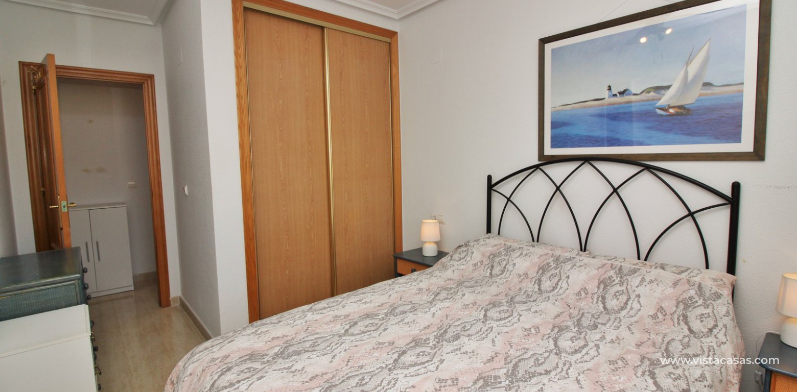 Apartment for sale in Costa Paraiso Villamartin master bedroom fitted wardrobes