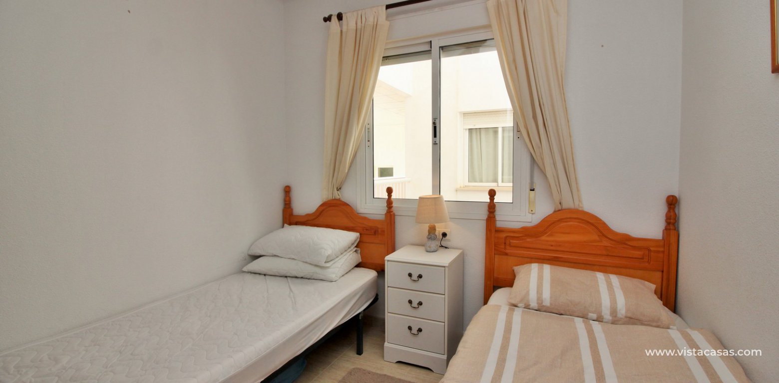 Apartment for sale in Costa Paraiso Villamartin twin bedroom