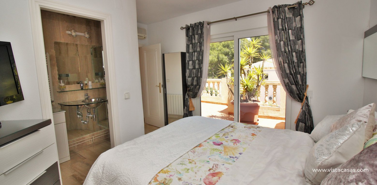 Detached villa for sale with private pool in Las Rambas golf master bedroom balcony