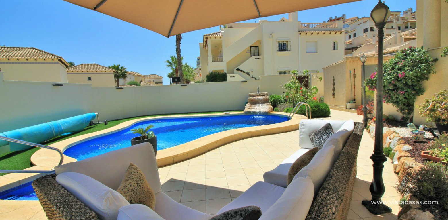 Detached villa for sale with private pool in Las Rambas golf outside seating area