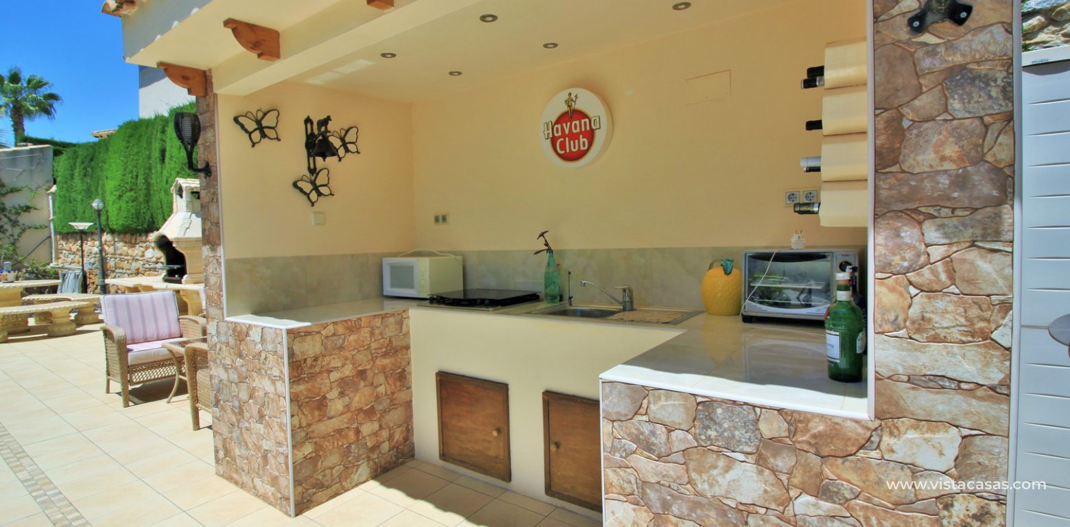 Detached villa for sale with private pool in Las Rambas golf summer kitchen