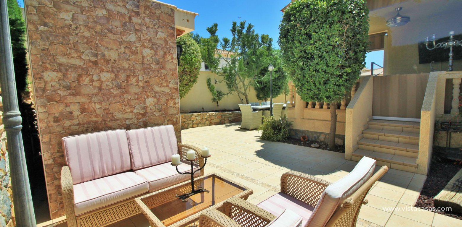 Detached villa for sale with private pool in Las Rambas golf rear dining area