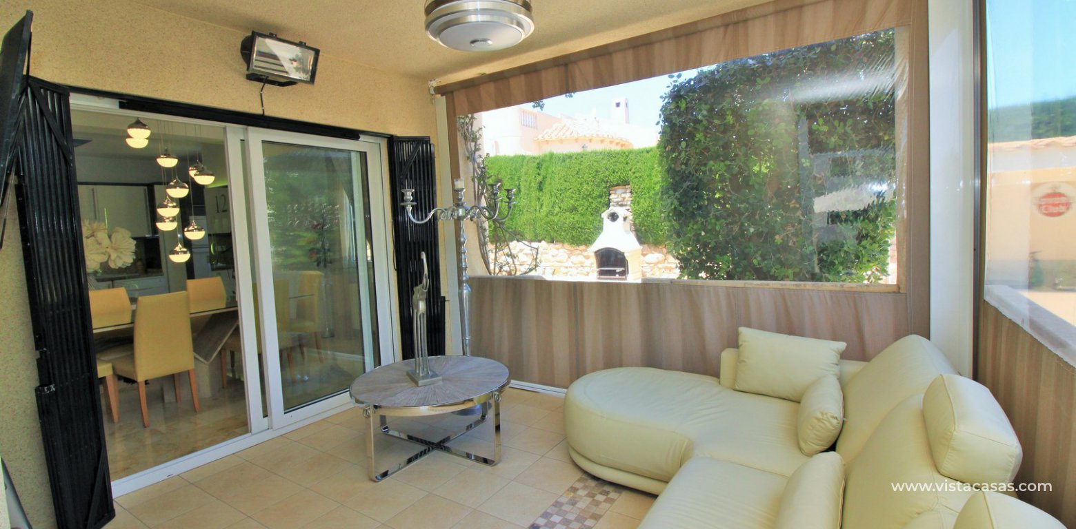 Detached villa for sale with private pool in Las Rambas golf covered porch