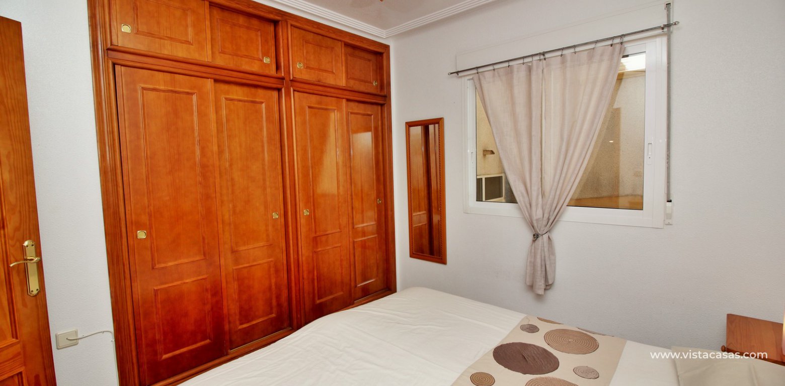 Apartment for sale in La Ciñuelica Punta Prima master bedroom fitted wardrobes