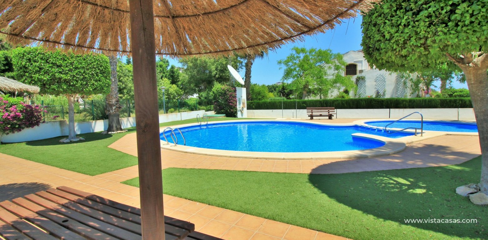 South-Facing 3 Bedroom Buhardilla Townhouse For Sale In R13 Pau 8 communal pool