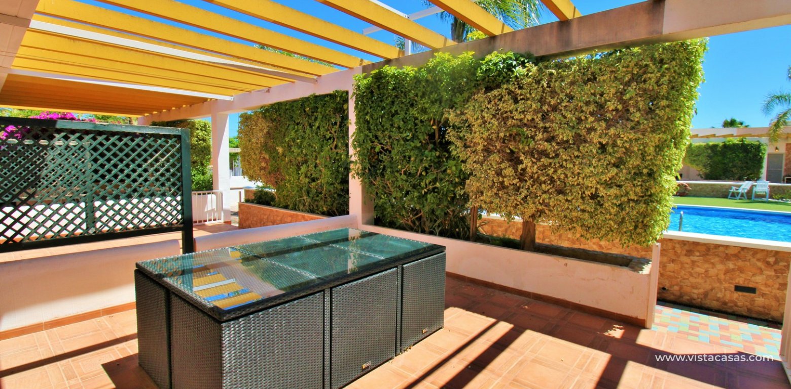South-Facing Beachside Bungalow For Sale in Res. Leman Mil Palmeras front terrace
