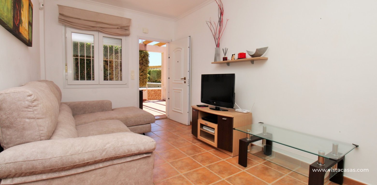 South-Facing Beachside Bungalow For Sale in Res. Leman Mil Palmeras lounge 3