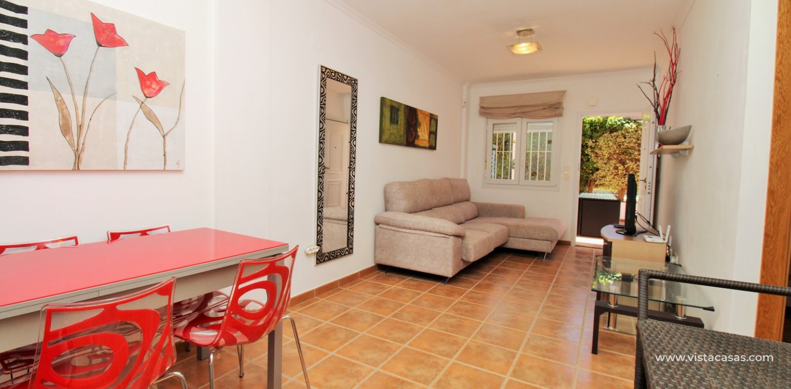 South-Facing Beachside Bungalow For Sale in Res. Leman Mil Palmeras lounge diner