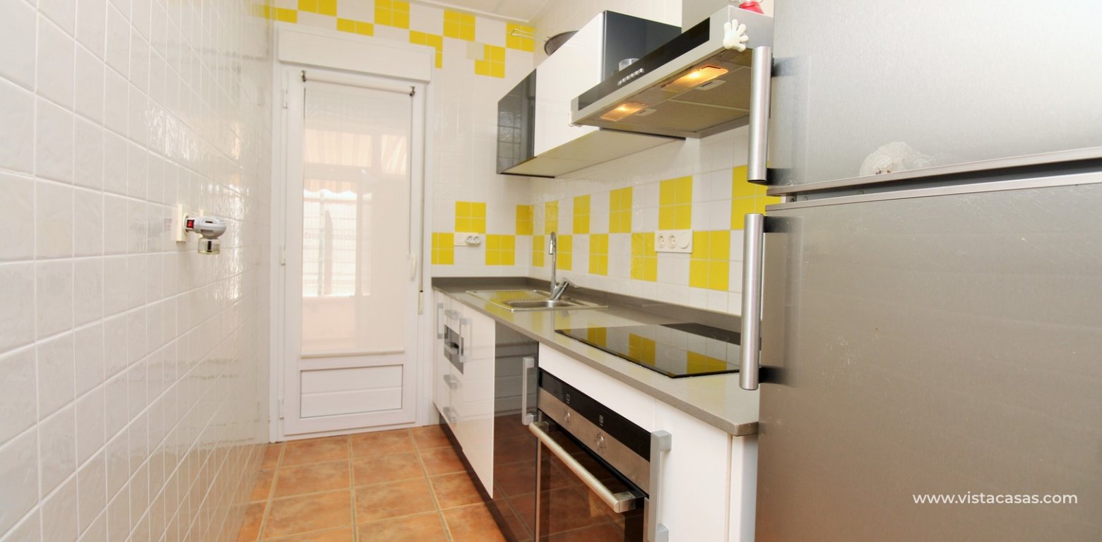 South-Facing Beachside Bungalow For Sale in Res. Leman Mil Palmeras kitchen