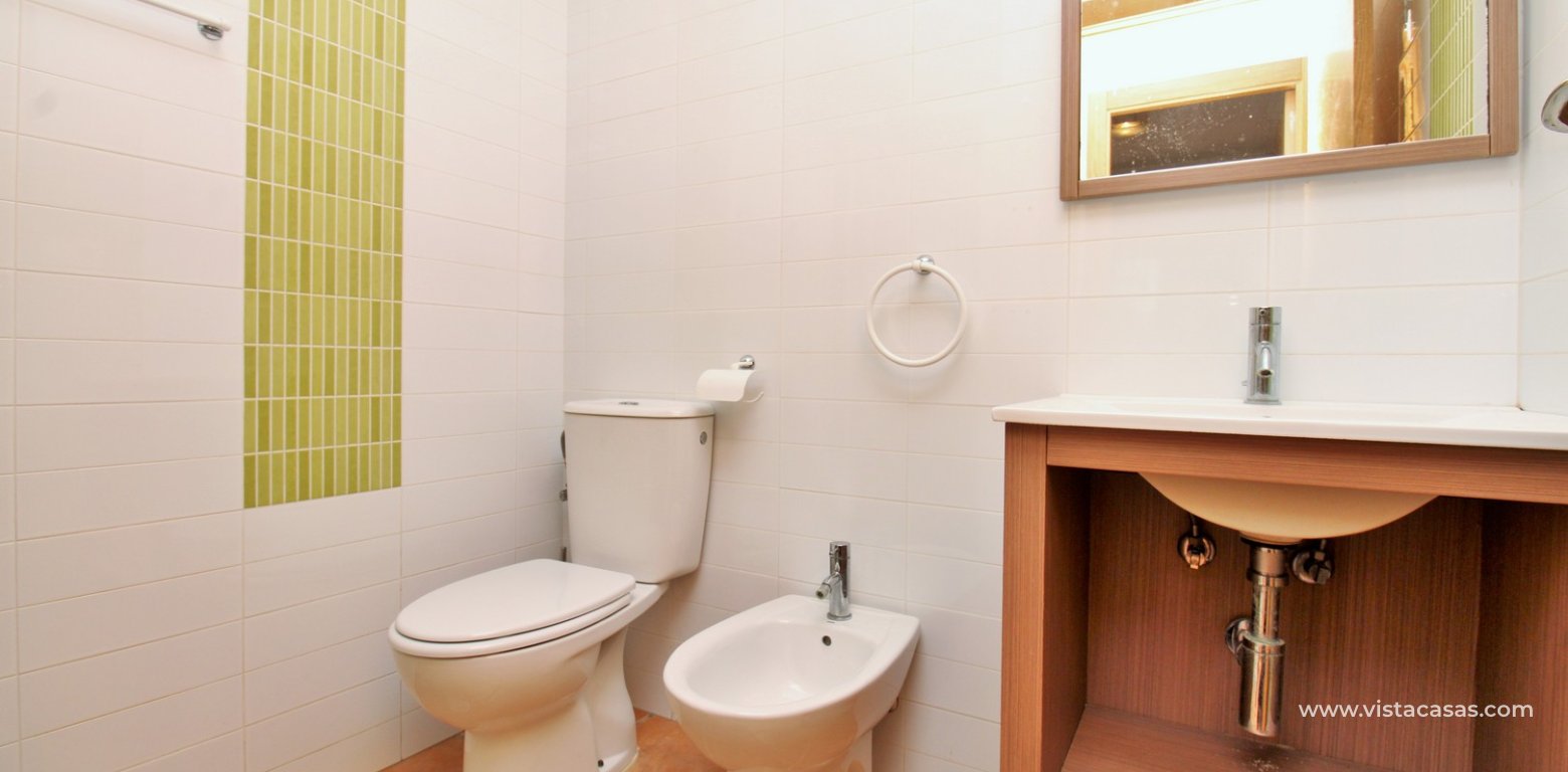 South-Facing Beachside Bungalow For Sale in Res. Leman Mil Palmeras bathroom