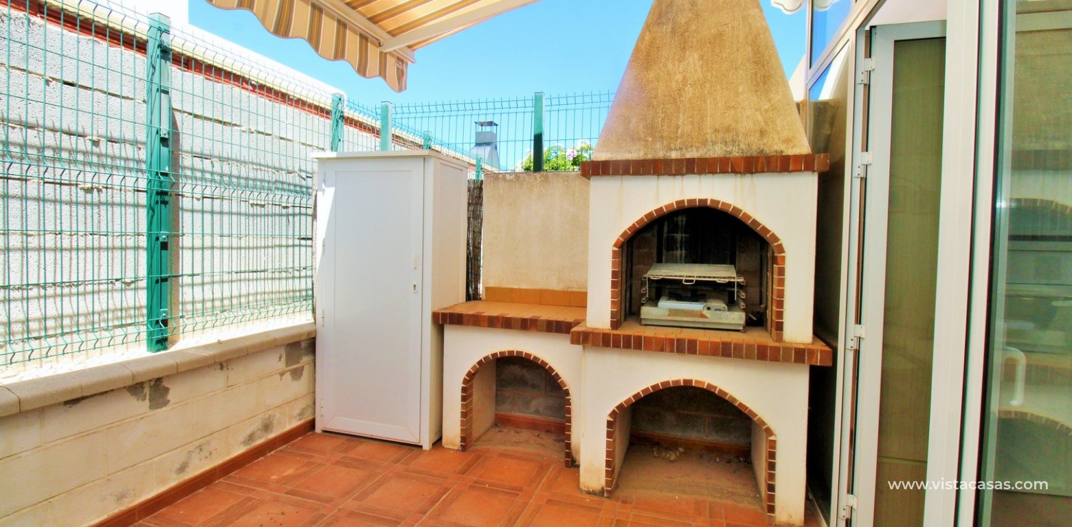 South-Facing Beachside Bungalow For Sale in Res. Leman Mil Palmeras rear terrace