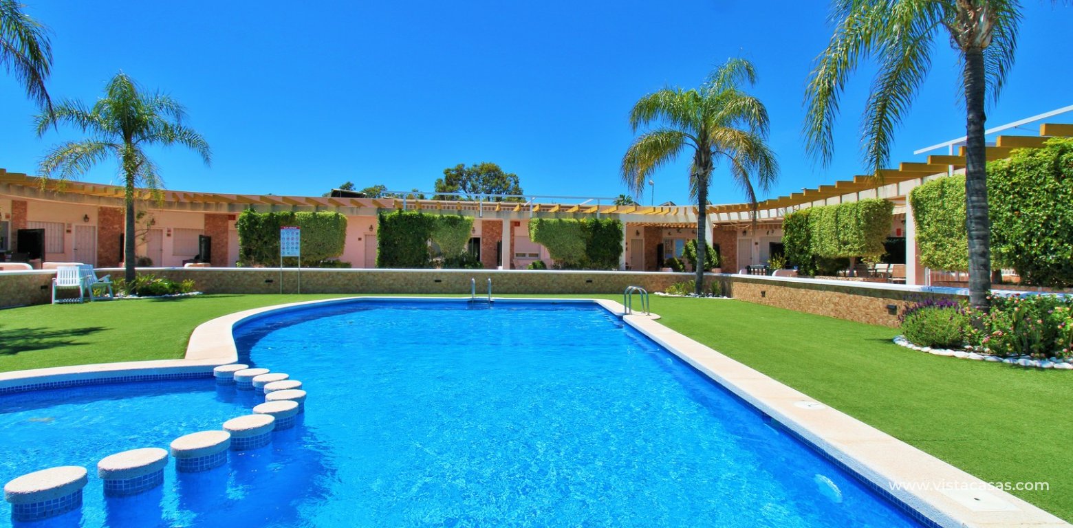 South-Facing Beachside Bungalow For Sale in Res. Leman Mil Palmeras communal pool