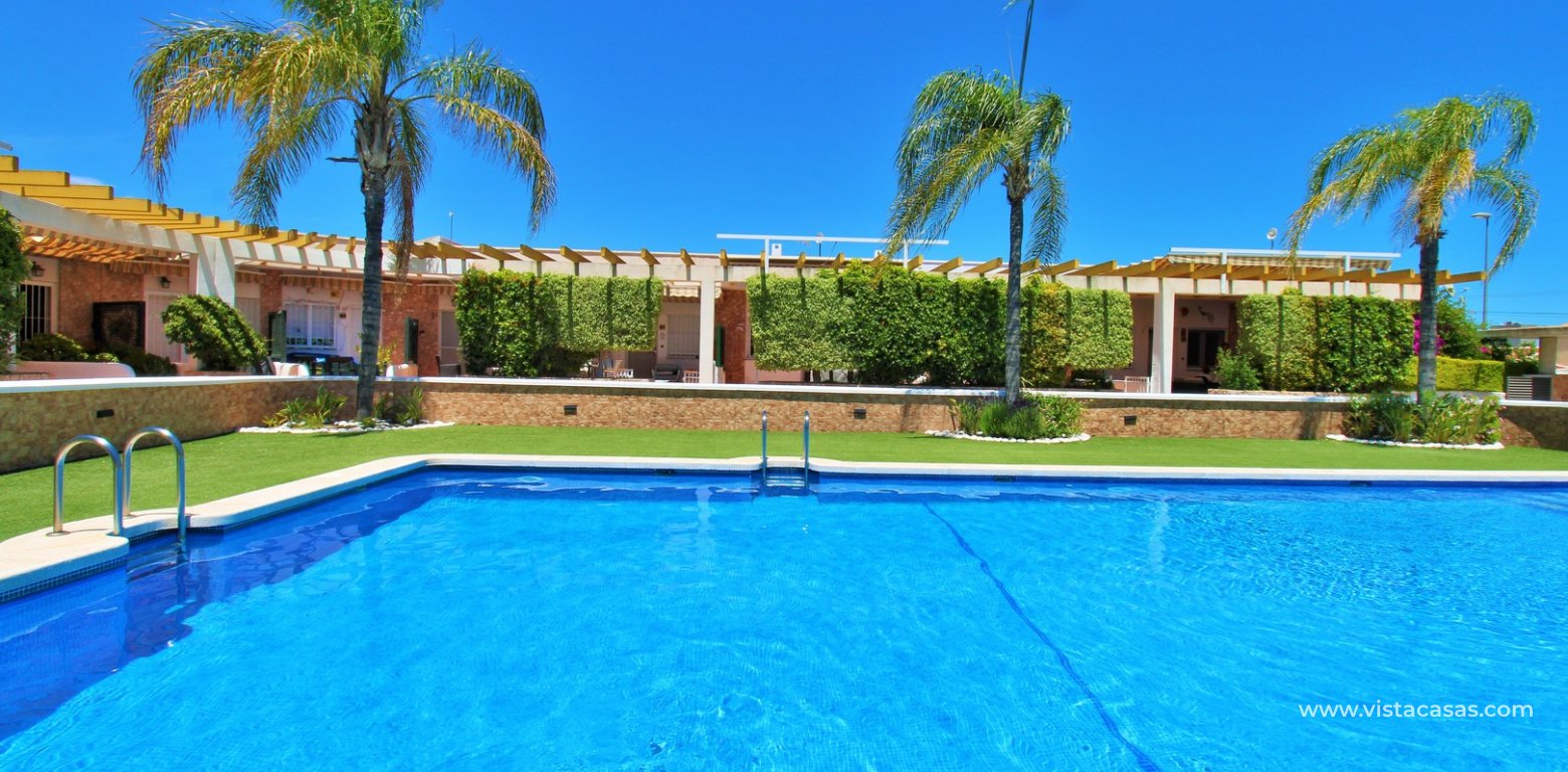 South-Facing Beachside Bungalow For Sale in Res. Leman Mil Palmeras swimming pool