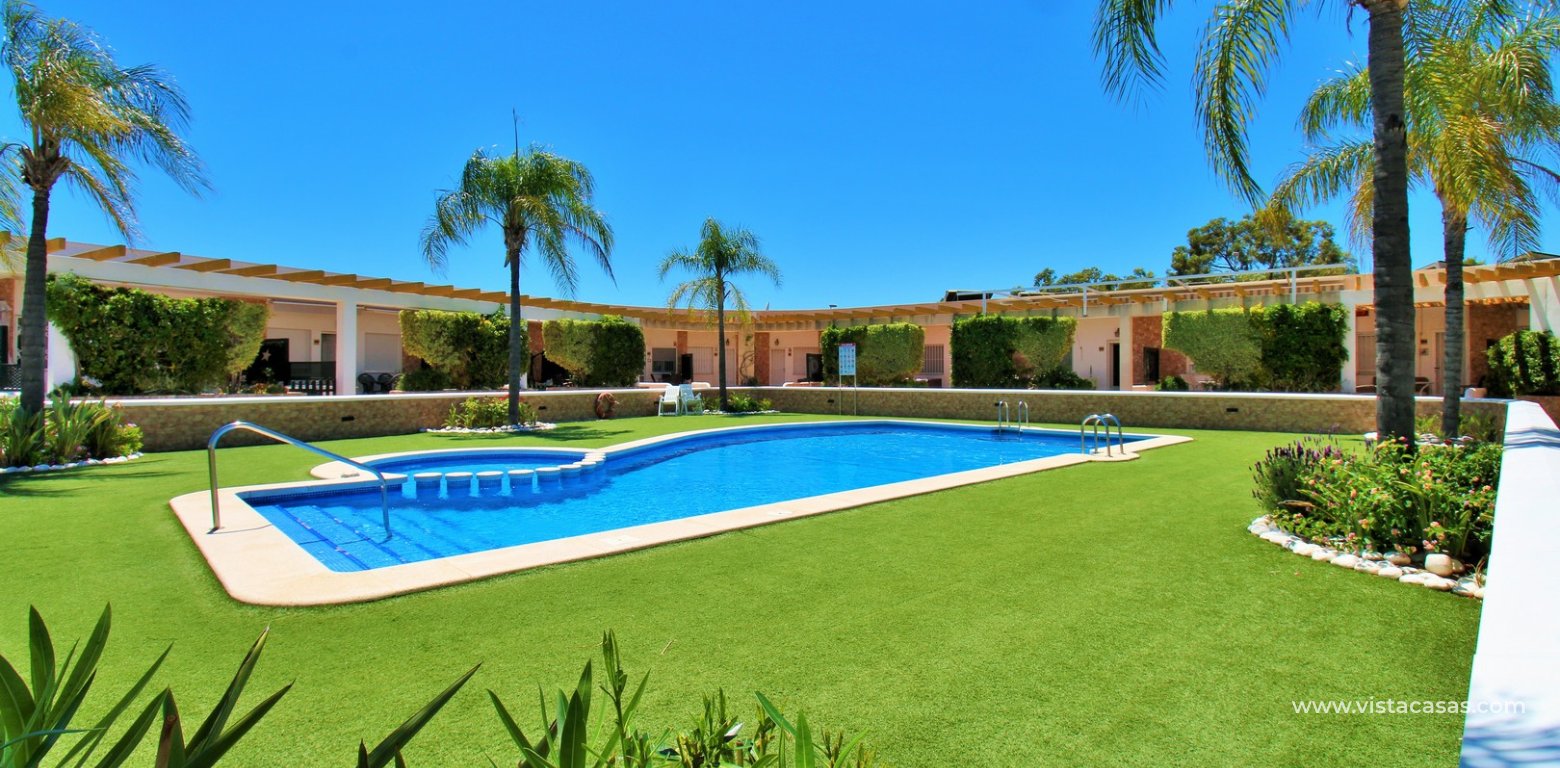South-Facing Beachside Bungalow For Sale in Res. Leman Mil Palmeras communal gardens