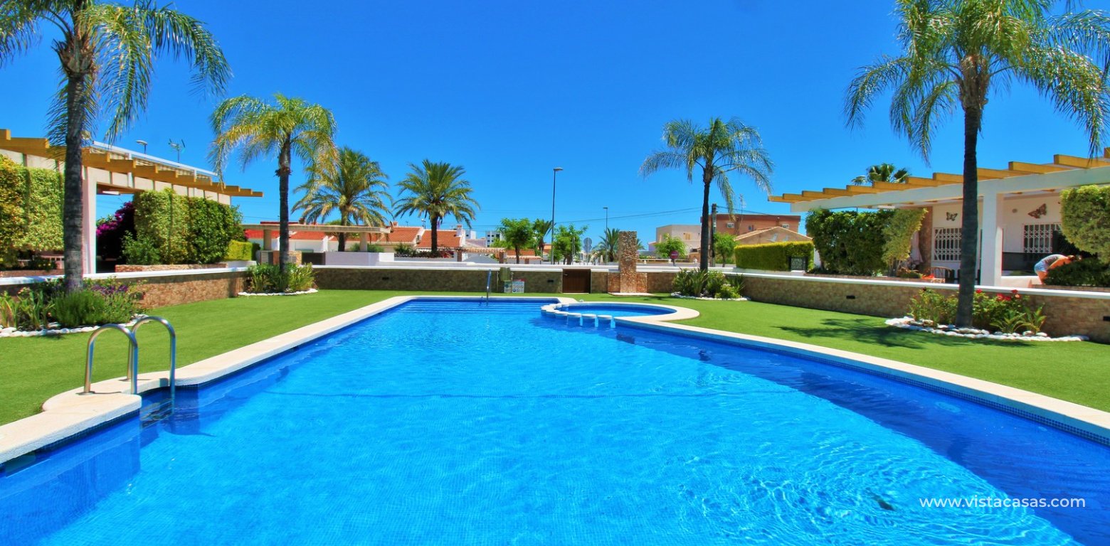 South-Facing Beachside Bungalow For Sale in Res. Leman Mil Palmeras pool 2