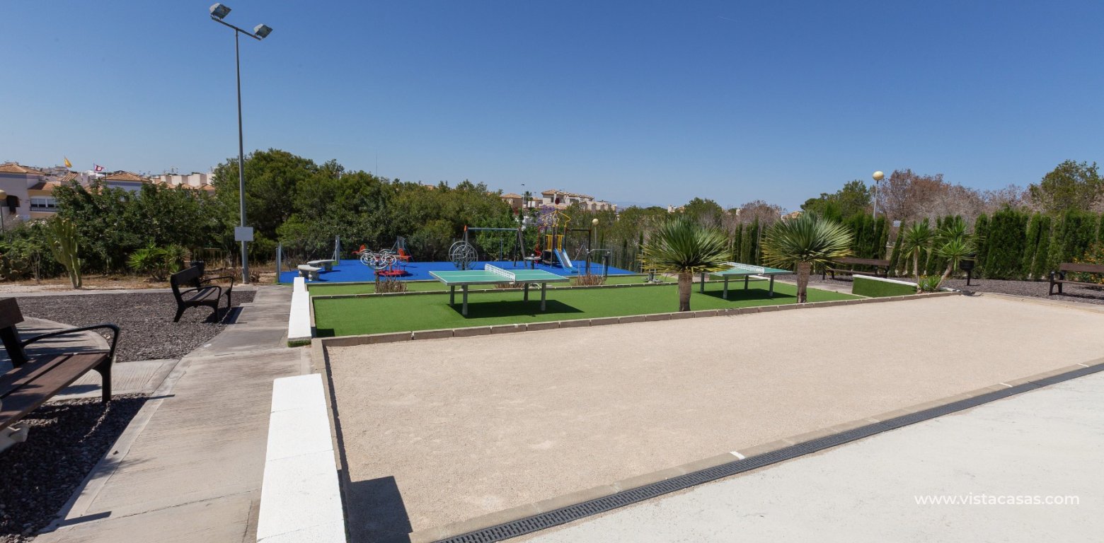 3 Bed Quad Villa with Private Pool For Sale in Dream Hills communal pool petanca