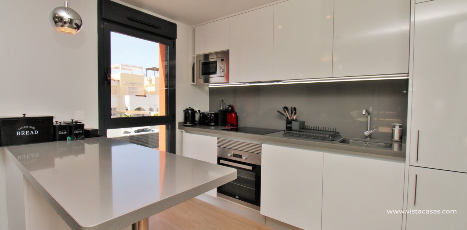 Modern 2 Bed Apartment For Sale in Palapa Golf Villamartin kitchen
