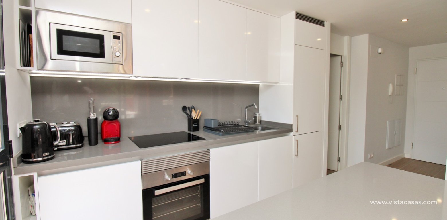 Modern 2 Bed Apartment For Sale in Palapa Golf Villamartin kitchen 2