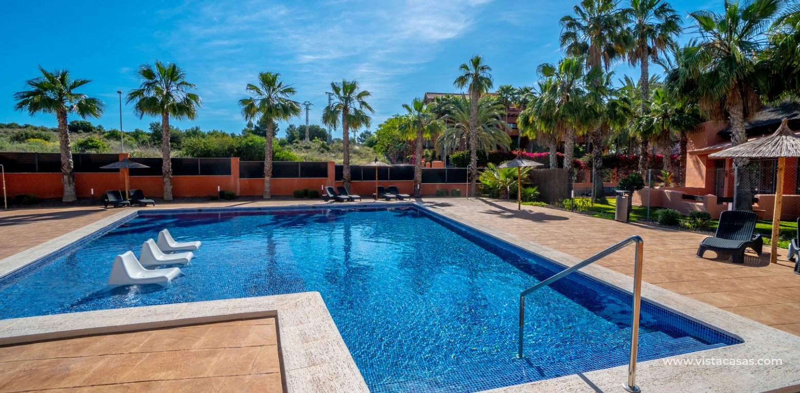 Modern 2 Bed Apartment For Sale in Palapa Golf Villamartin swimming pool