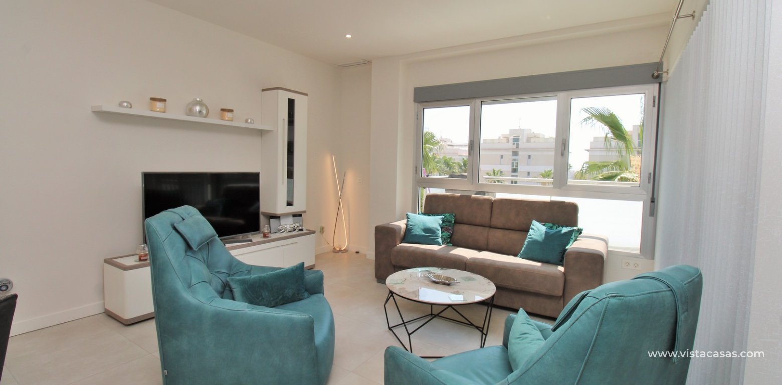 2 Bedroom Pool View Apartment For Sale In Mirador de Villamartin Los Dolses living area 2