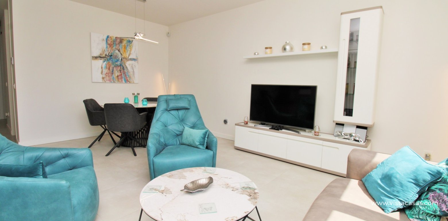 2 Bedroom Pool View Apartment For Sale In Mirador de Villamartin Los Dolses living area 4