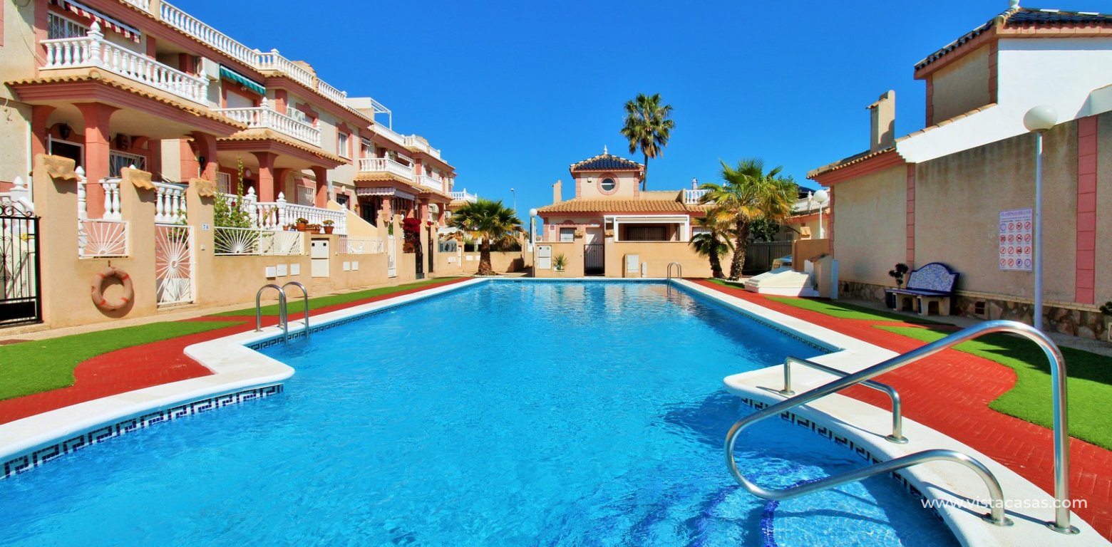 Semi-Detached Townhouse For Sale in Flamingo Hills 2 Playa Flamenca communal swimming pool