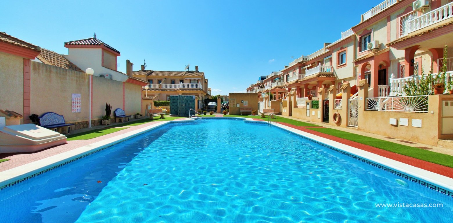 Semi-Detached Townhouse For Sale in Flamingo Hills 2 Playa Flamenca community pool