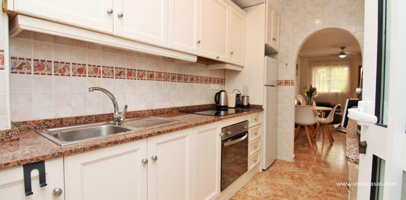Ground Floor Apartment  For Sale in R1 La Ciñuelica Punta Prima kitchen back