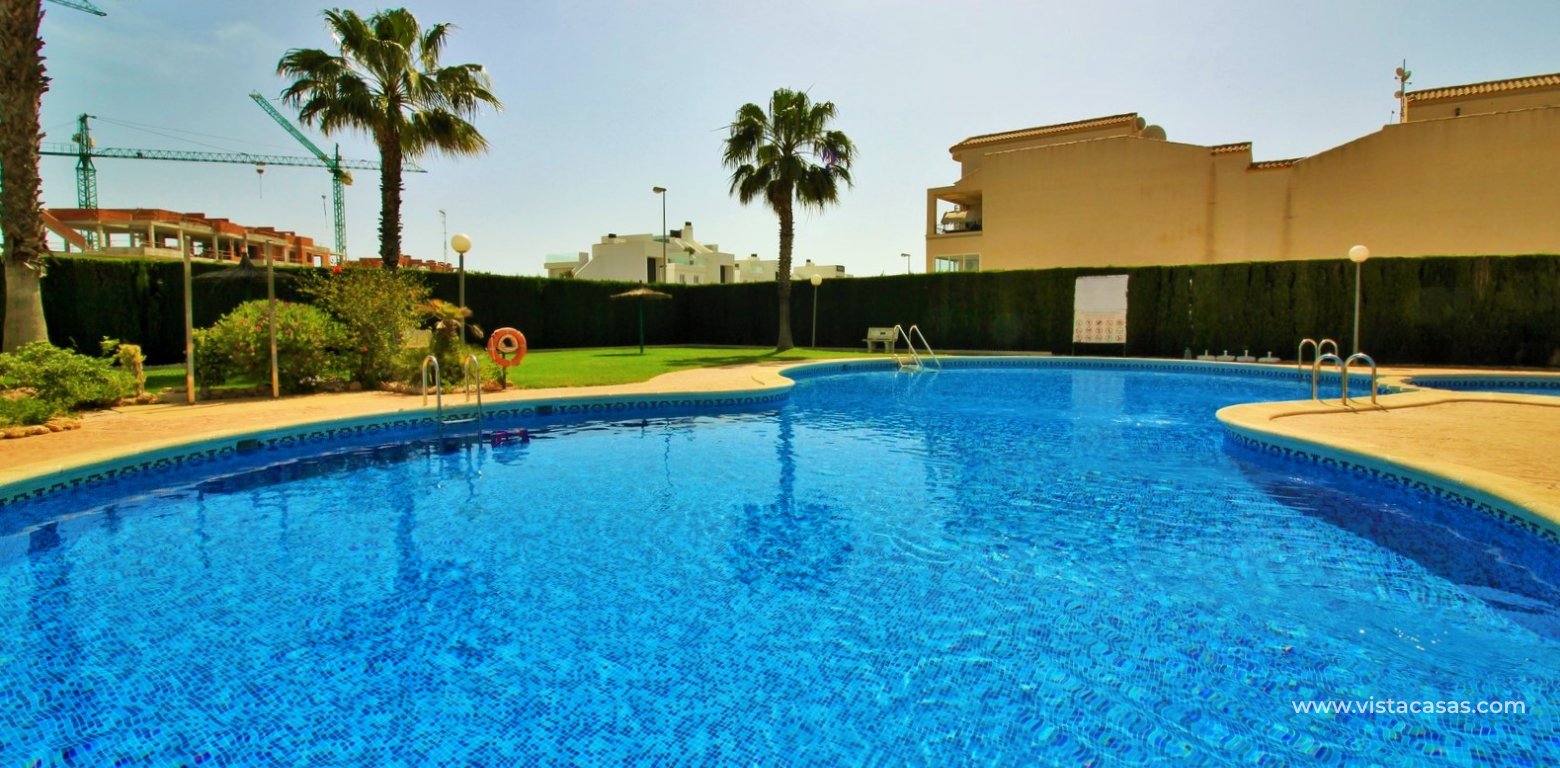 Ground Floor Apartment  For Sale in R1 La Ciñuelica Punta Prima swimming pool