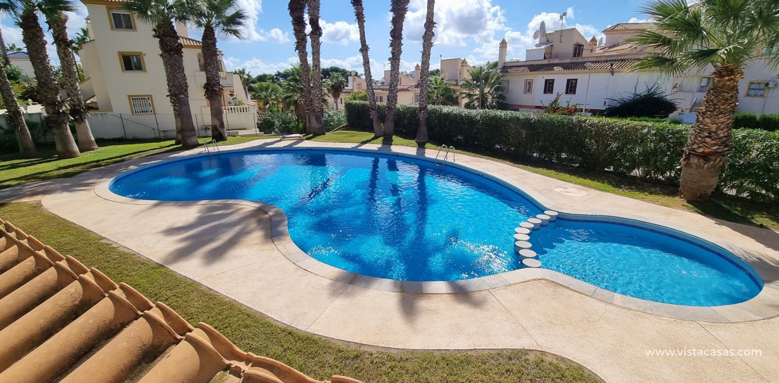 Detached villa with pool for sale in Villamartin pool view communal swimming pool