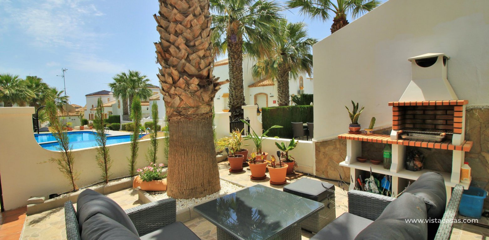 Lola bungalow for sale overlooking the pool in R12/13 Los Dolses front garden