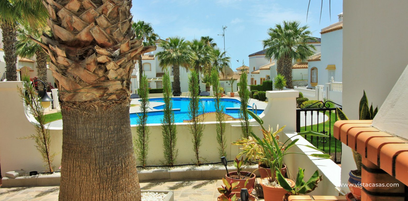 Lola bungalow for sale overlooking the pool in R12/13 Los Dolses garden pool view