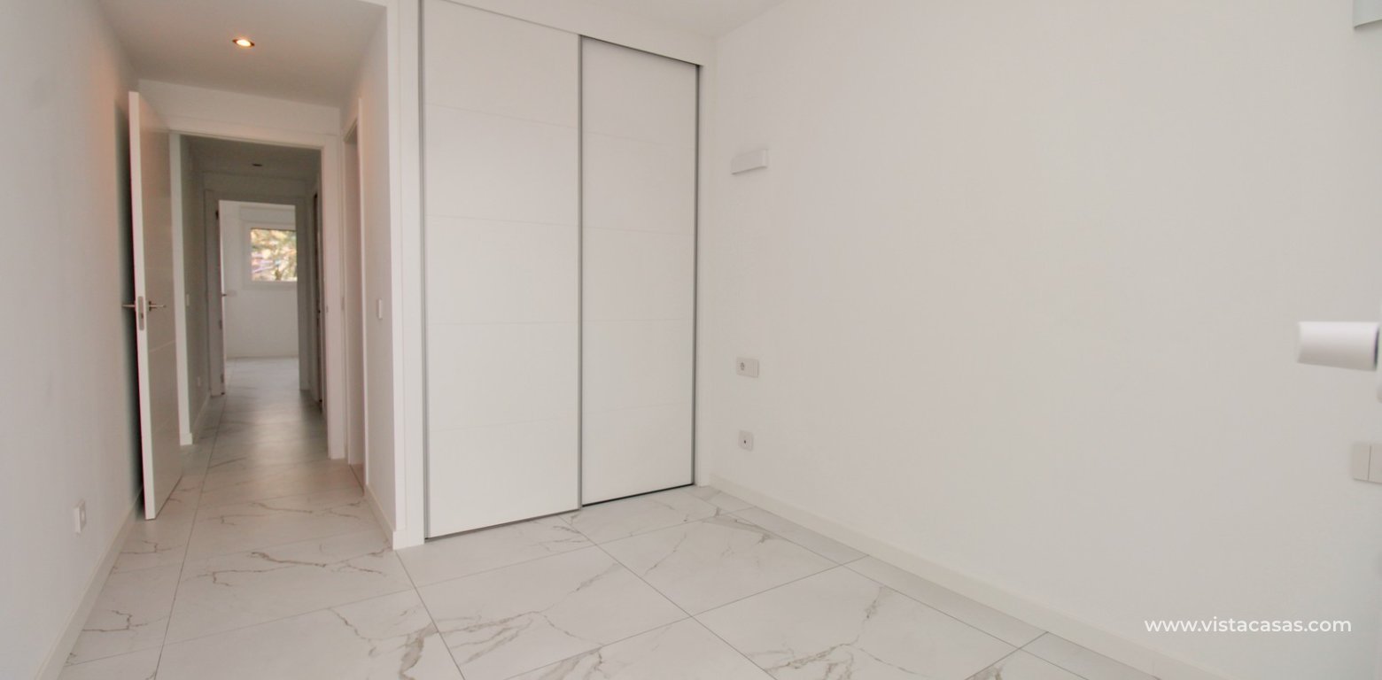 Resale 2 bedroom apartment for sale in Valonia Resort Punta Prima master bedroom fitted wardrobes