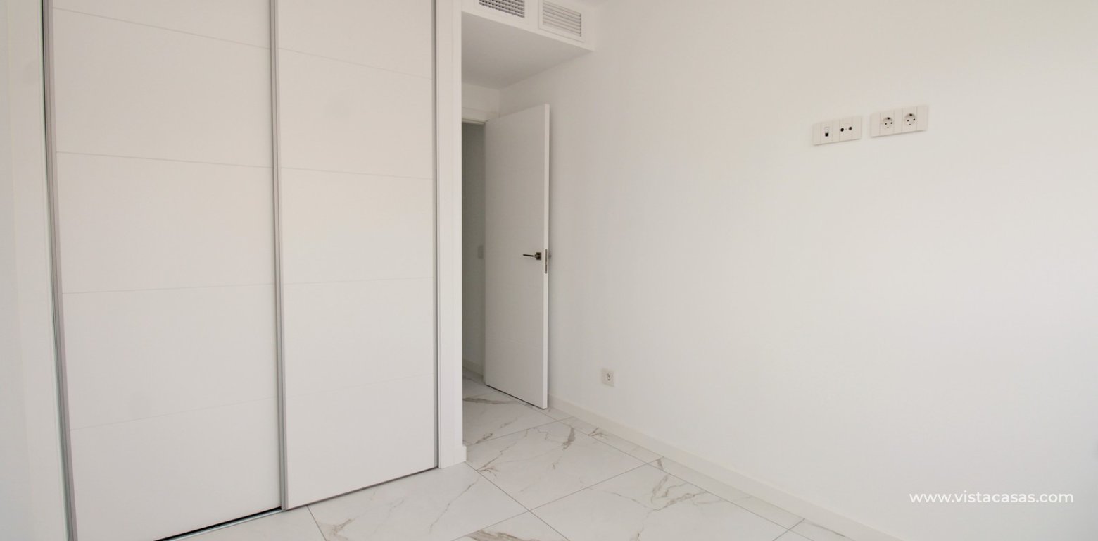 Resale 2 bedroom apartment for sale in Valonia Resort Punta Prima twin bedroom fitted wardrobes