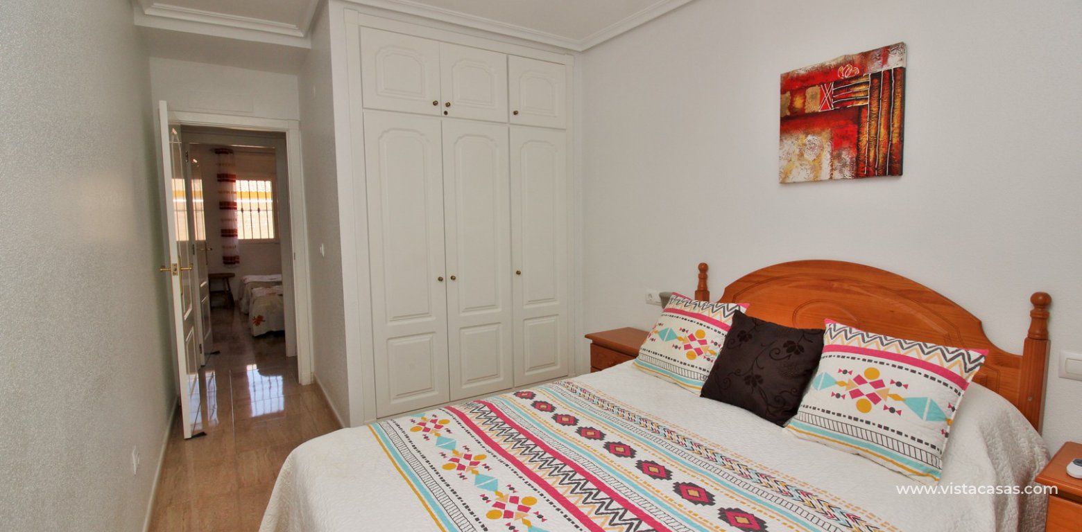 Townhouse for sale in Bahia Golf Pau 8 Villamartin master bedroom fitted wardrobes