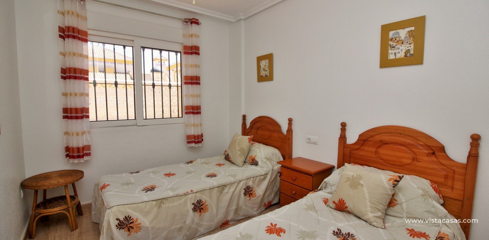 Townhouse for sale in Bahia Golf Pau 8 Villamartin twin bedroom