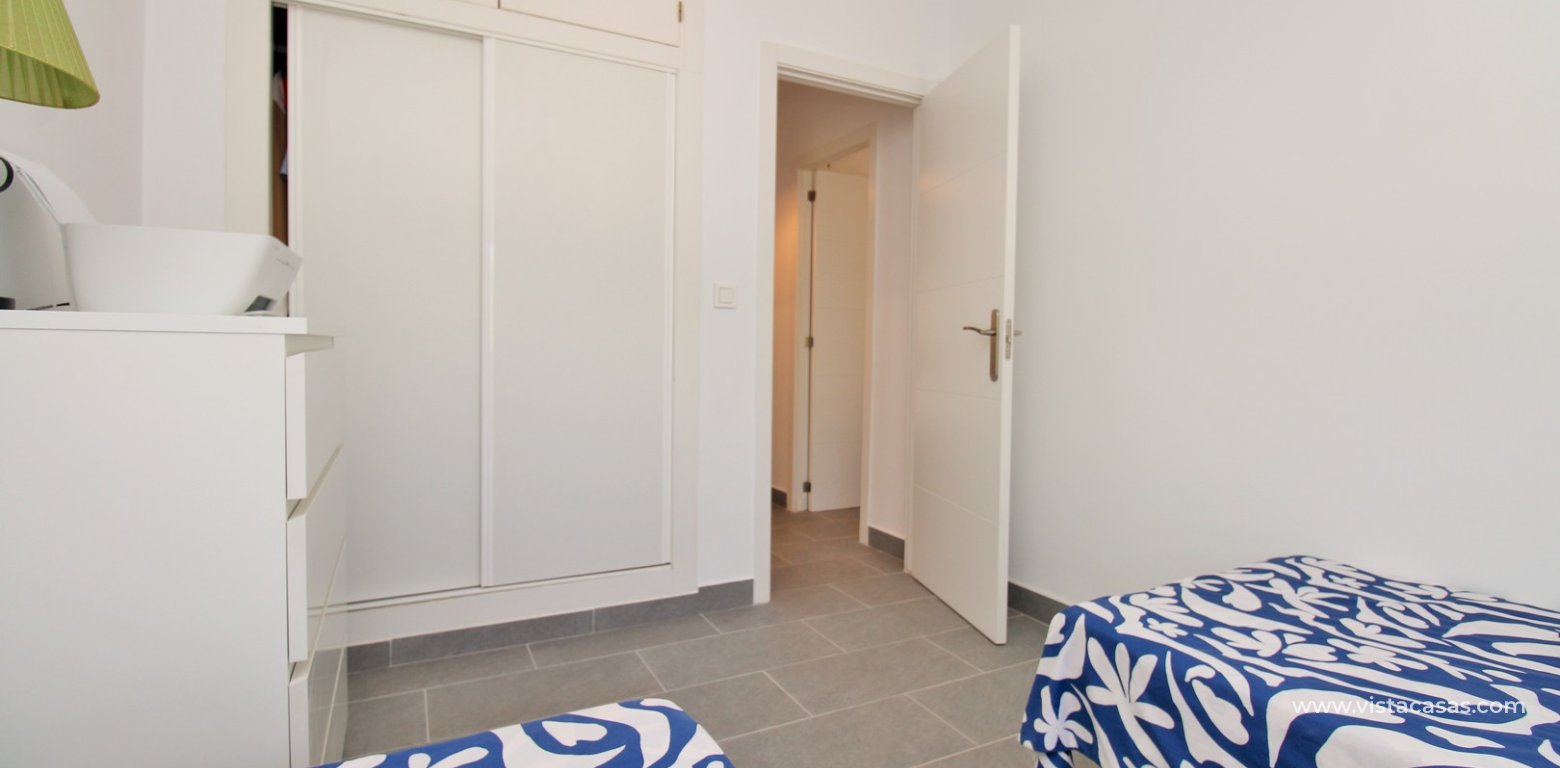 Renovated Lola Bungalow in Valencias Villamartin twin bedroom fitted wardrobes