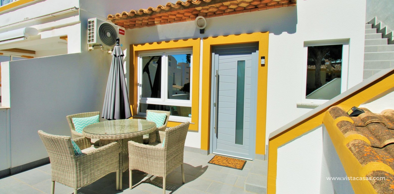 Renovated Lola Bungalow in Valencias Villamartin front raised terrace