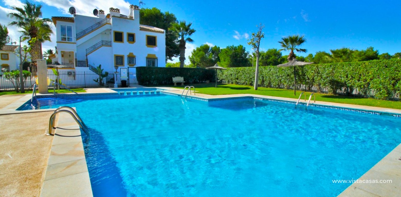 Renovated Lola Bungalow in Valencias Villamartin communal swimming pool