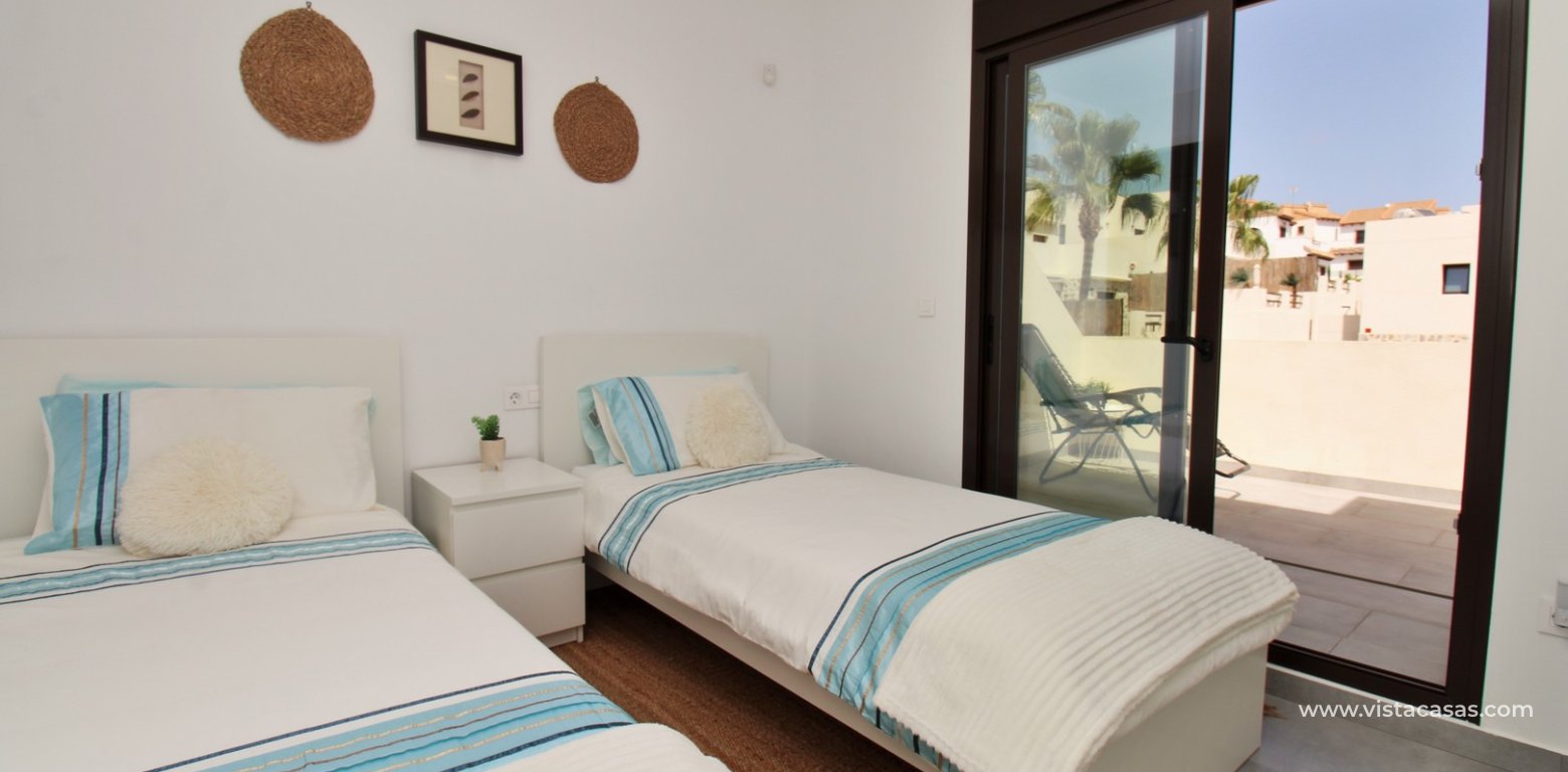 Modern 3 Bed Townhouse in Ilios Pau 8 Villamartin twin bedroom