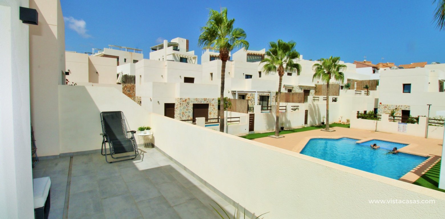 Modern 3 Bed Townhouse in Ilios Pau 8 Villamartin balcony views of pool