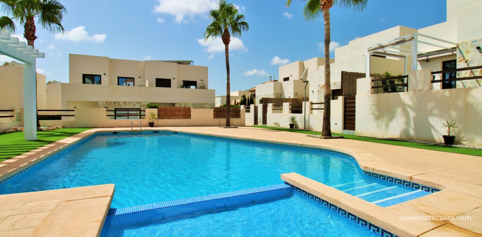Modern 3 Bed Townhouse in Ilios Pau 8 Villamartin communal swimming pool