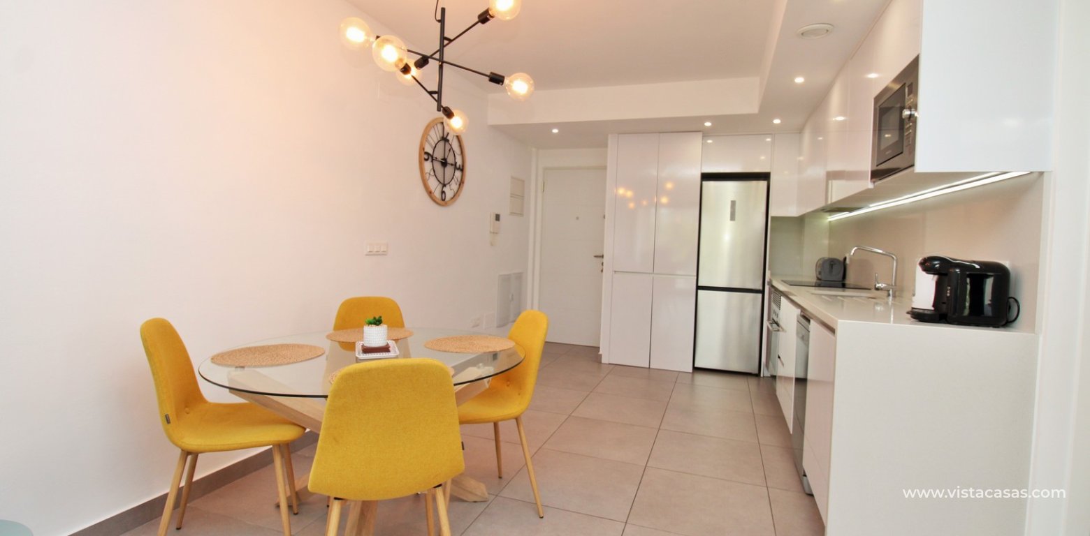 2 Bed Pool View Apartment in Valentino Golf 2 Villamartin dining area kitchen