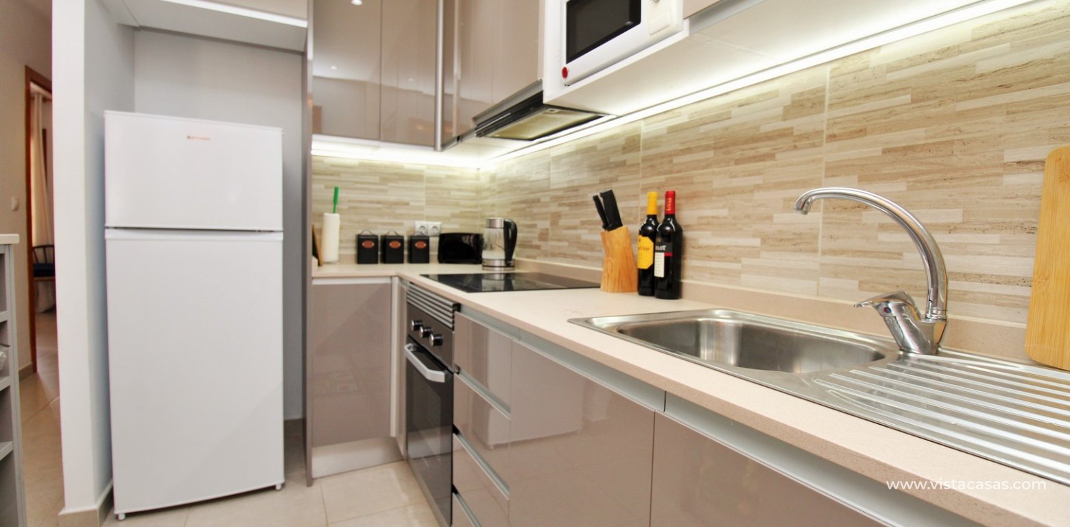 South-Facing Lola Bungalow For Sale in Verdemar III Villamartin modern kitchen