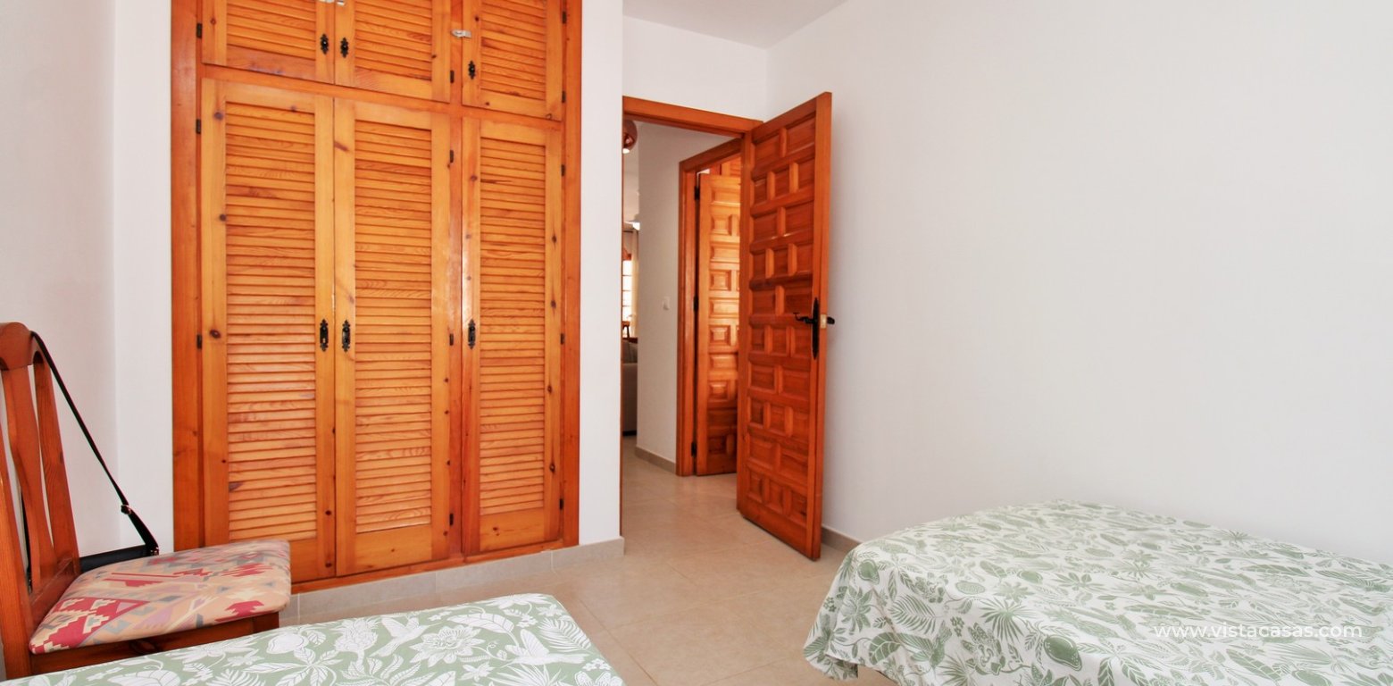 South-Facing Lola Bungalow For Sale in Verdemar III Villamartin twin bedroom fitted wardrobes