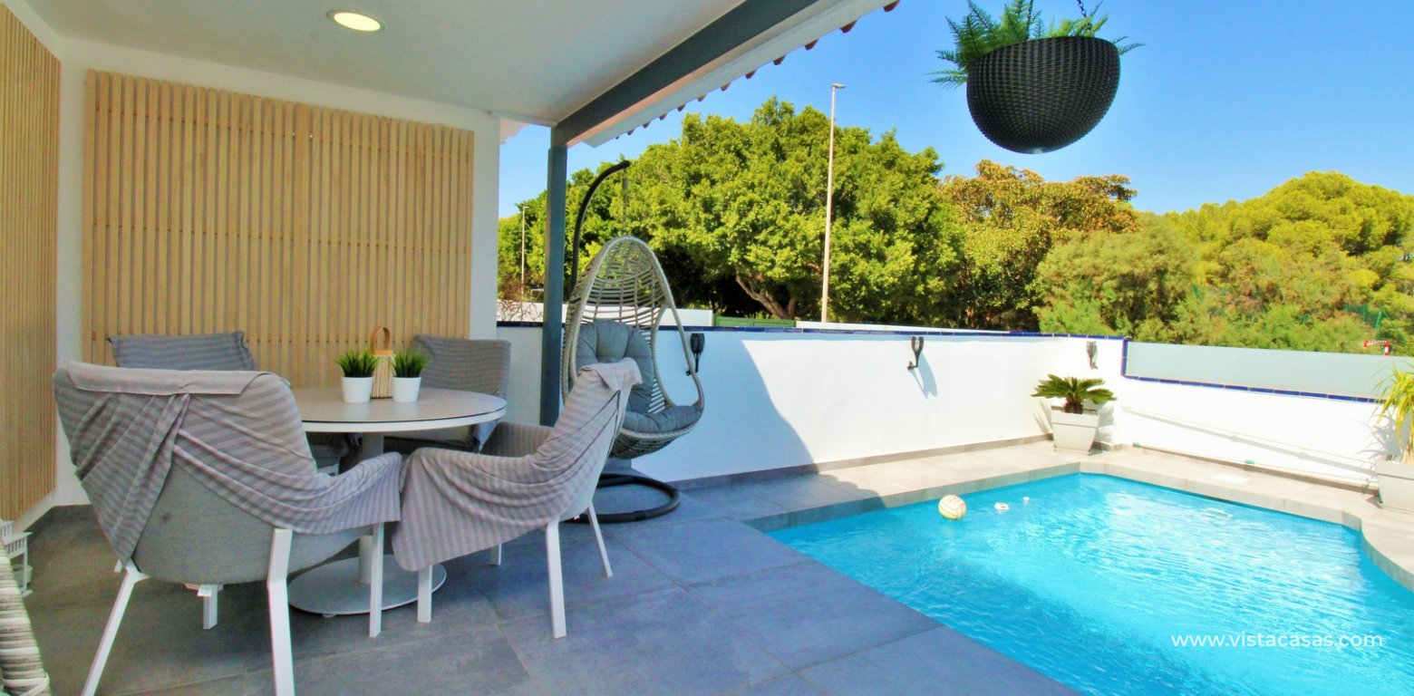 Beachside semi-detached house for sale in Mil Palmeras with private swimming pool terrace pool